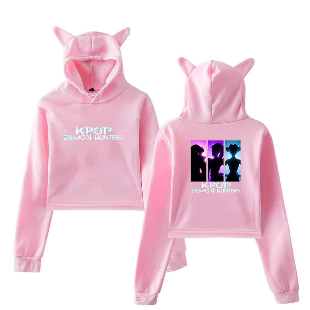 Kpop Demon Hunters hoodie set with pink color, cat ear hood, and graphic print featuring silhouettes and text. Perfect for K-pop fans and cosplay enthusiasts. High-quality and comfortable.