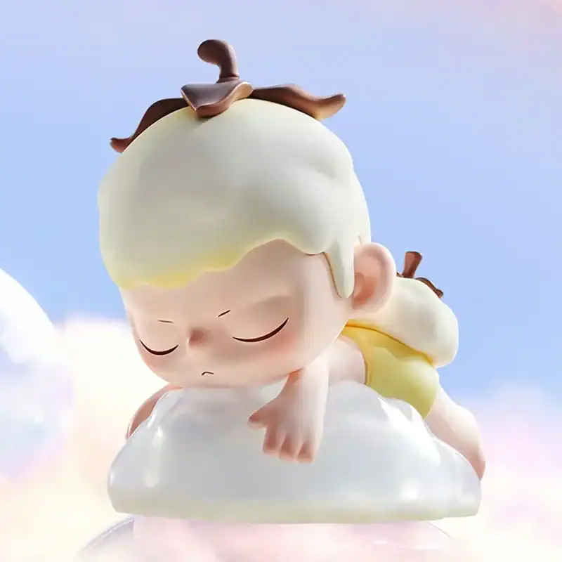 Cute anime-inspired demon hunter character figurine wearing yellow outfit and sitting on a cloud.