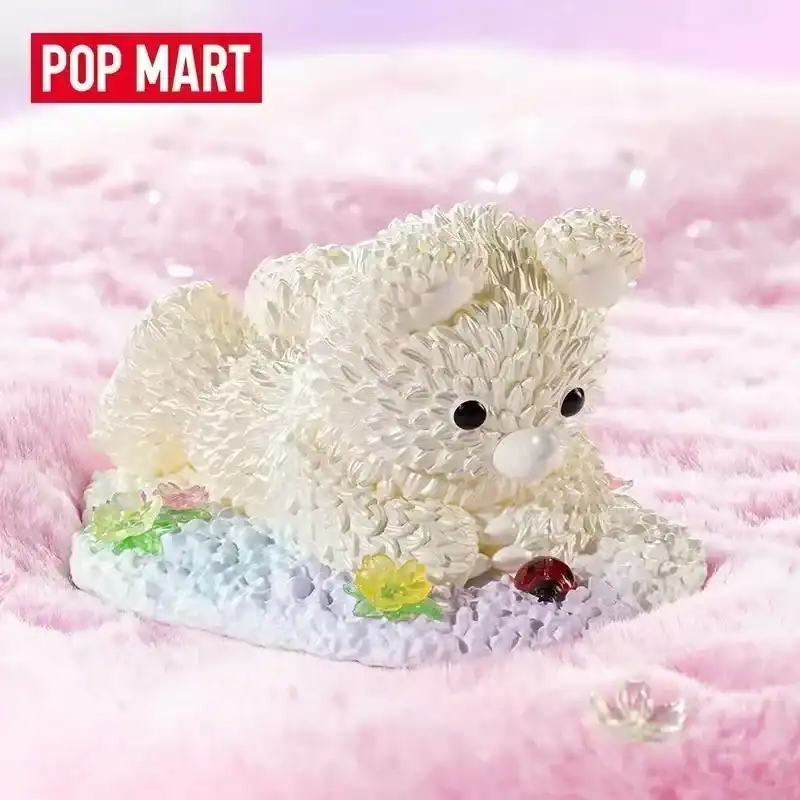 Cute collectible toy resembling a bear with floral accents, perfect for K-pop demon hunters merch fans. Unique and adorable design, ideal for display or as a gift.